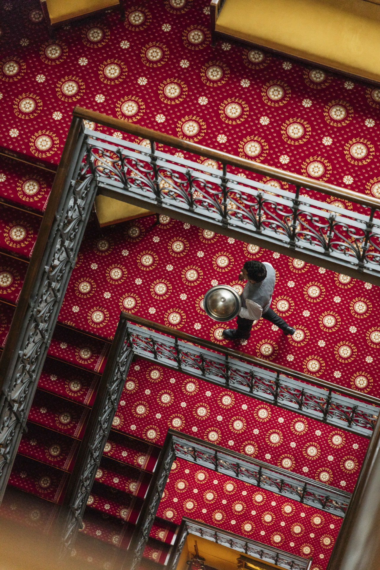 2 Waiter Coming Down The Stairs